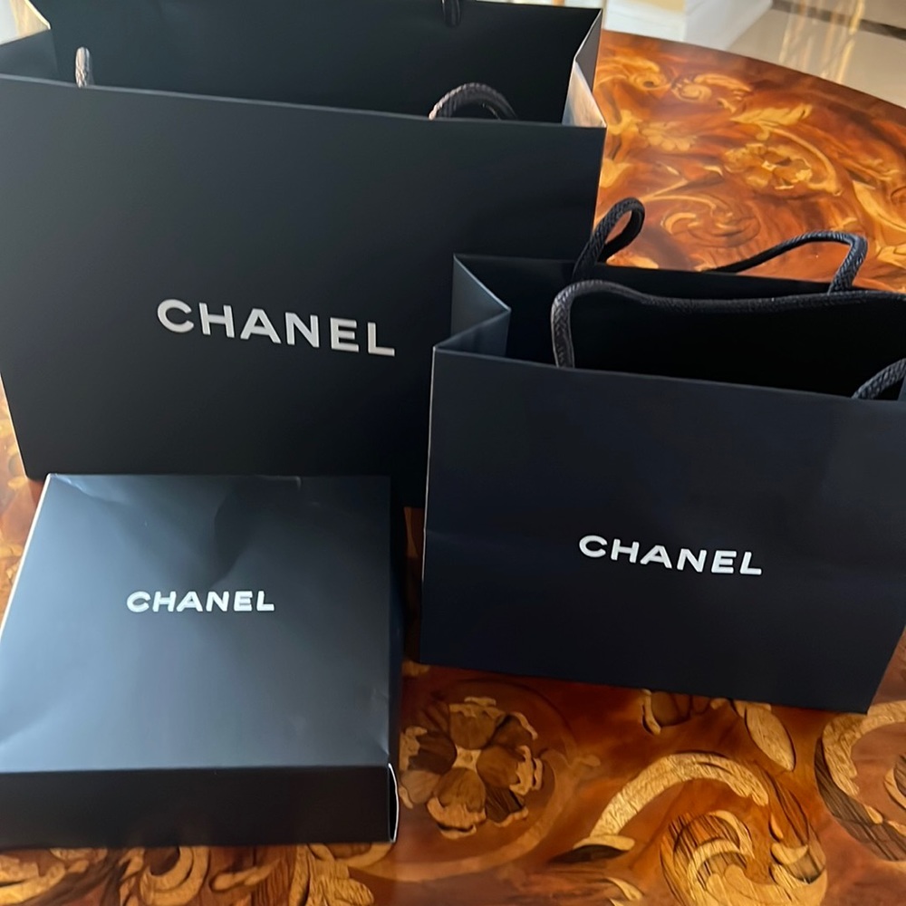 Chanel bags and box with Chanel flower